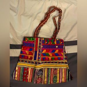 Traditional handmade embroidered bag with zipper.